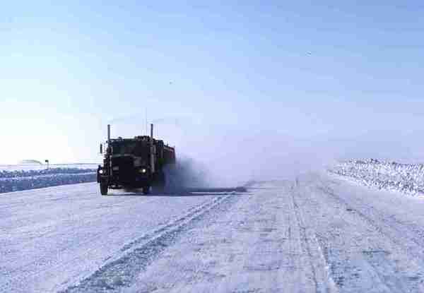 Truck driving on ice road – Mackenzie Delta.